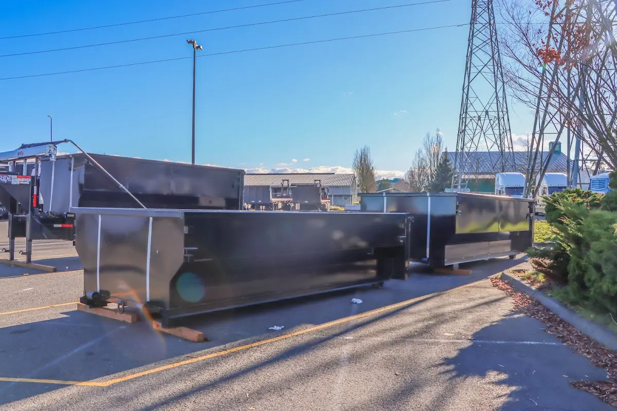 Roll-off dumpster ready for waste disposal at job site for Concrete Dumpster Rental in Steubenville